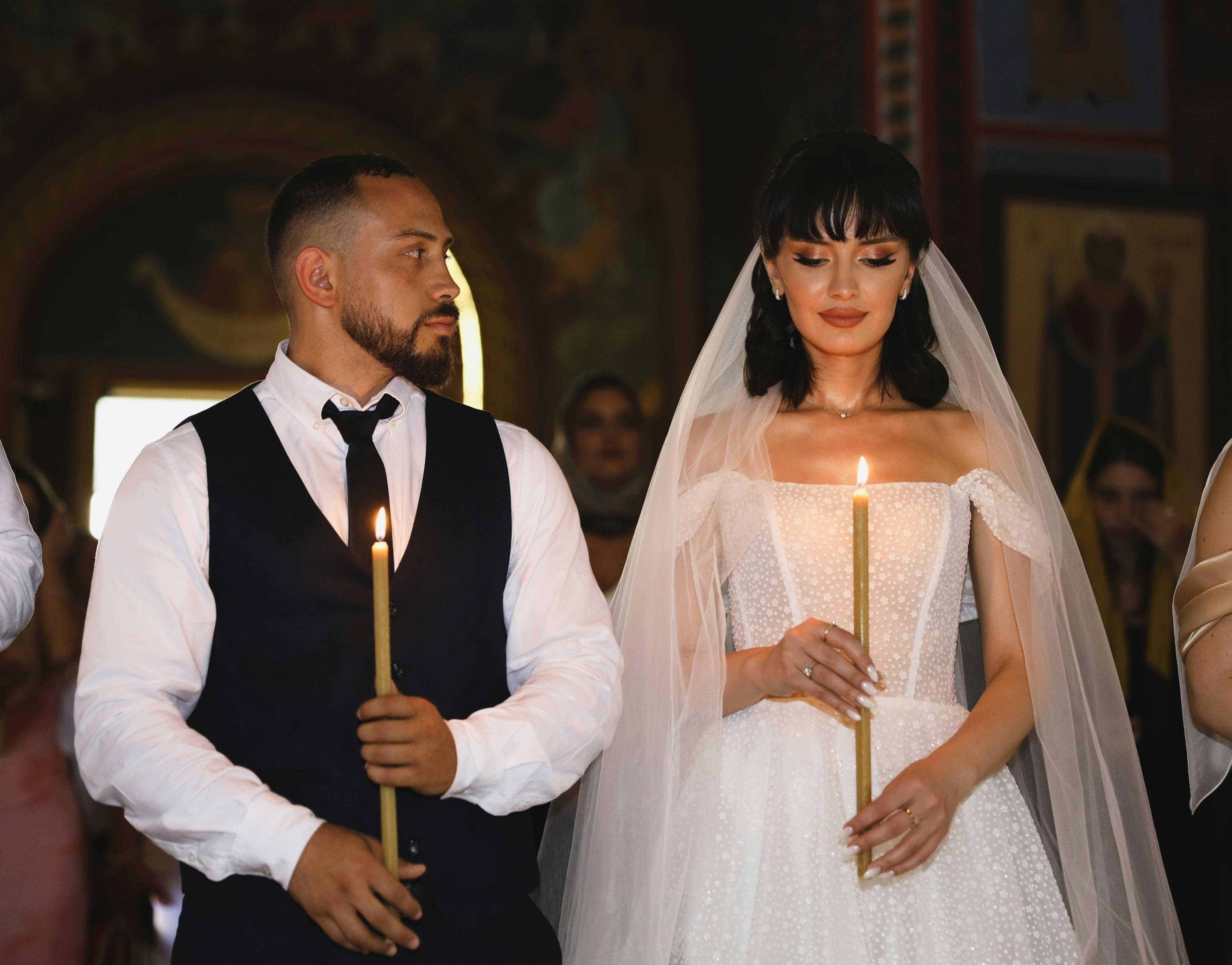 groom looking at the bride